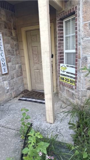 Completed exterior support work at the front of a home